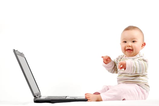 baby having fun with laptop #13