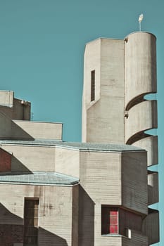 Christi Auferstehung church tower with spiral staircase on blue sky background in Cologne, Germany