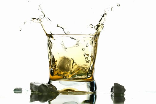 whisky splash alcohol drops isolated on white