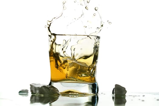 whisky splash alcohol drops isolated on white