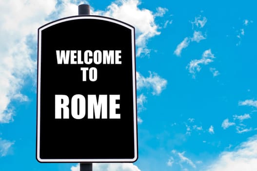 Black road sign with greeting message WELCOME TO ROME isolated over clear blue sky background with available copy space. Travel destination concept  image