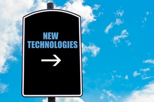 NEW TECHNOLOGIES motivational quote written on road sign isolated over clear blue sky background with available copy space. Concept  image
