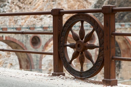 Close-up of a particular of parapet an road of marble.