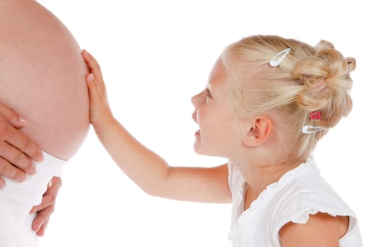 cute little girl talking to her new baby-brother