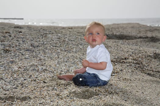 cute baby boy on the beach