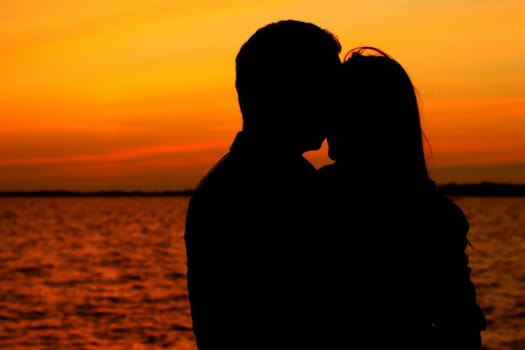 relax on gold sunset  romance flirt of two person on vacation