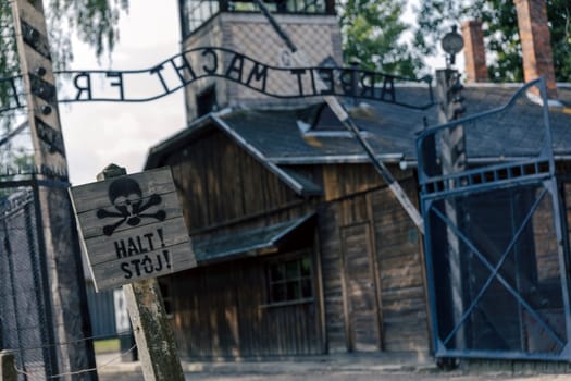 Entrance gate to former German Nazi concentration and extermination camp in Auschwitz in Poland