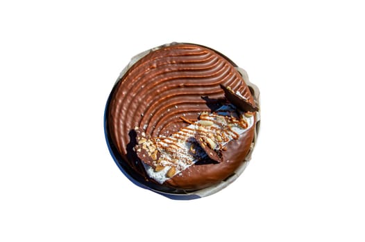 Chocolate cake in a box isolated on a white background. Chocolate dessert. Sweet food. Birthday cake. Cream culinary product. Cocoa dessert. White background.