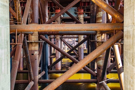 Reinforced concrete structure of the bridge under construction. Bridge over the Dnieper River in Kiev. Engineering structure. Building construction. Water crossing. Industry. Ukraine.
