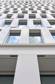 Looking upwards at the facade of a high-rise building in Berlin