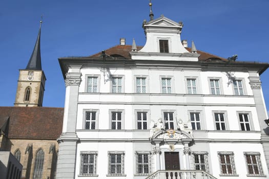 The town of Iphofen is located in the Lower Franconian district of Kitzingen,in Bavaria,Germany.  The city is known for its wine growing and historic old town. The town hall on the market square.