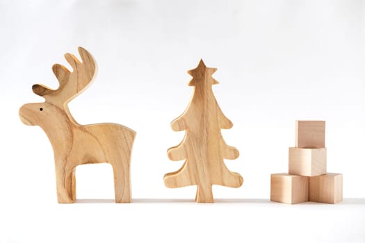 Christmas winter festive ornament. Reindeer, pine tree and gift boxes decoration on white background. Minimal holiday greeting season. Merry Christmas and Happy New Year.