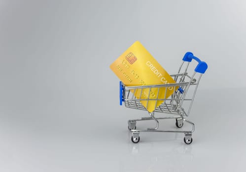Shopping car and mockup credit card  on light and shadow background. shopping online concept.