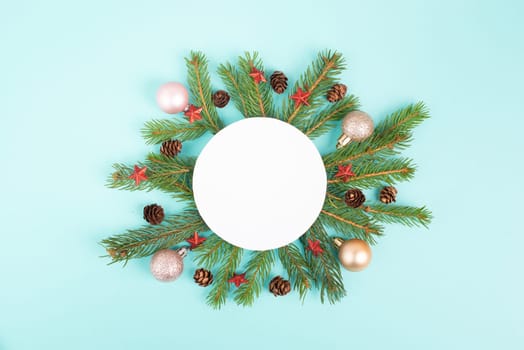 Christmas holiday background, frame with fir branches, baubles, candy cane and cones, winter season greeting card
