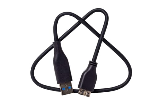 Black Micro USB cable to connect laptop to external hard drives for backup up files isolated on a white background. Clipping path. Macro.