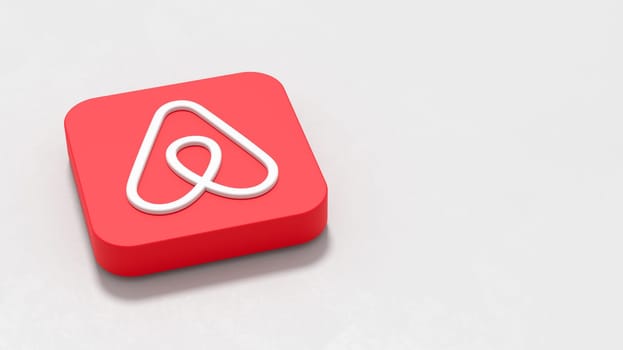 Airbnb App Icon 3D Symbol Shape on Plastered Gray Background with Copy Space 3D Illustration
