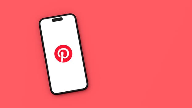 Pinterest Logo on Mobile Phone Screen on Flat Red Background with Copy Space 3D Render Illustration, Top View