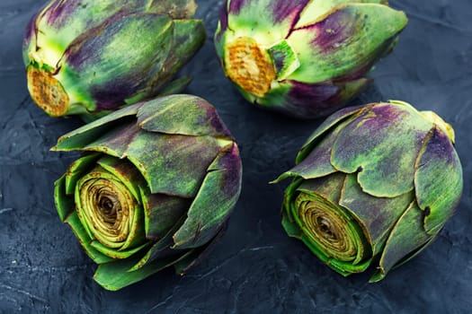 Unopened raw artichoke buds, food. Italian cuisine