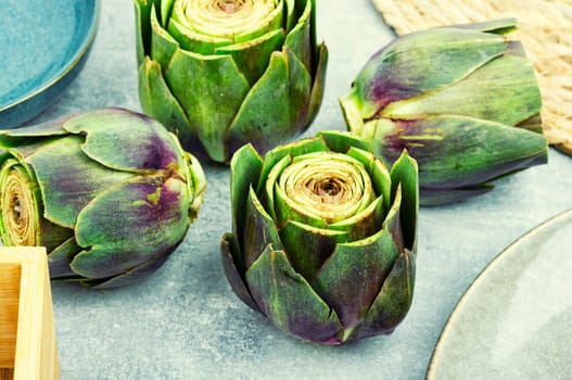 Unopened raw artichoke buds, food. Italian cuisine