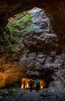 Unidentified visitors at Jayona mine, declared natural monument. Fuente del Arco, Badajoz, Spain