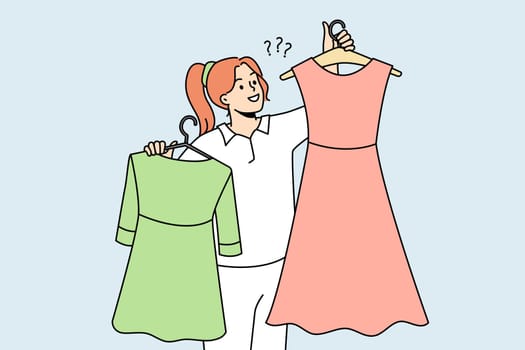 Smiling woman holding dresses on hangers choosing garment in shop or mall. Happy girl with clothes buying new collection in store. Fashion and style. Vector illustration.