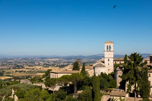 Church in Assisi village in Umbria region, Italy. The town is famous for the most important Italian St. Francis Basilica (Basilica di San Francesco)