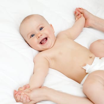 Mother massaging her child, shallow focus