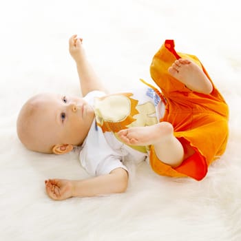 Portrait of sweet little baby boy on white background