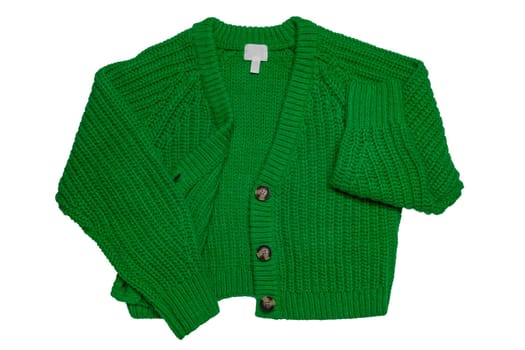 Casual elegant fluffy long-sleeved cardigan with V-neck and button closure isolated on a white background. Womens green sweater or jumper. Autumn and winter fashion.
