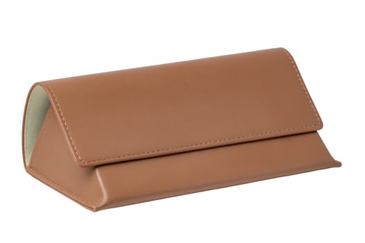 Close-up of a trendy closed brown leather case for the eyeglasses or glasses isolated on a white background. Clipping path. Macro. Protection for sunglasses.