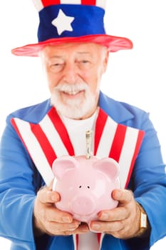 Closeup of Uncle Sam's hands as he holds a piggy bank with a 20 dollar bill in it.  Focus on the pig.
