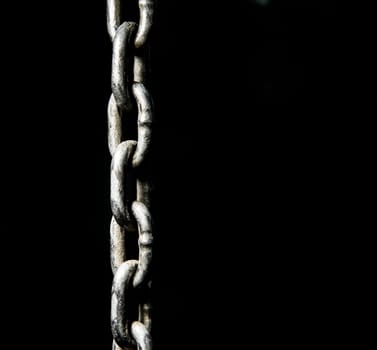 Chain Close Up with black background.