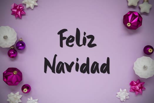 Christmas Card With Spanish Text Feliz Navidad Means Merry Christmas. Purple Christmas Background With Romantic And Brilliant Decoration Like Balls.