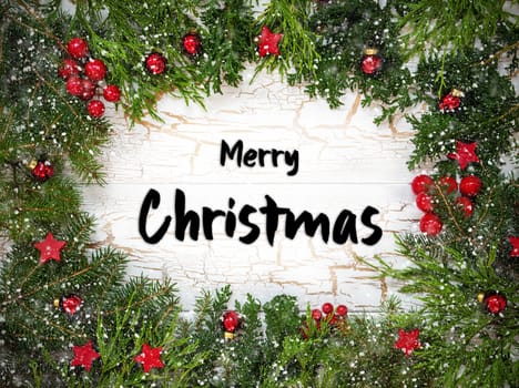 Christmas Card With Fir Branches And English Text Merry Christmas. White Wooden Background With Vintage Design, Christmas Decoration Like Red Ornament Balls And Snowflakes.