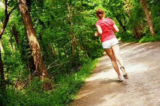 Woman trail runner, from a complete series of photos.