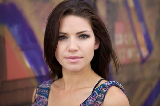 Beautiful Brunette with an edge and darker eye makeup looking at cameraBeautiful Brunette with an edge and darker eye makeupA Sexy Brunette Looking Toward The Camera with an edgy look