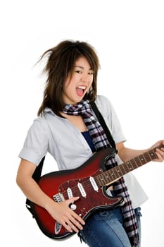 Caucasian teenager posing as a punk rocker on white background