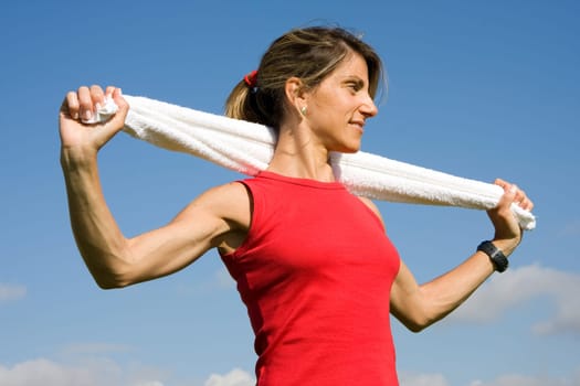 Young sporty women with a white towel