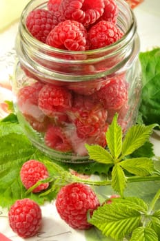 raspeberries in a glass, ingredients for jam