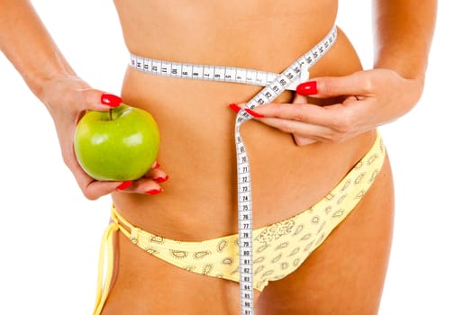 young pretty blond woman controls her waist