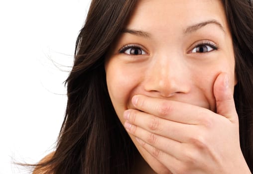 Closeup of very happy and surprised mixed asian / caucasian woman. Isolated on white background.