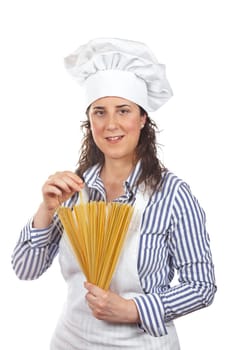 Attractive cook woman holding a spaghetti uncooked