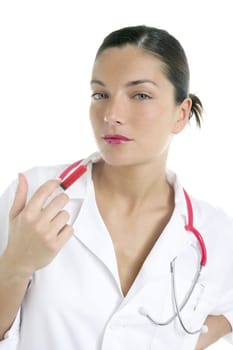Doctor woman with red syringe and needle in her lips over white background