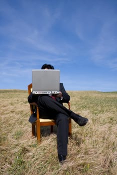 Business man sitting on a chair working out