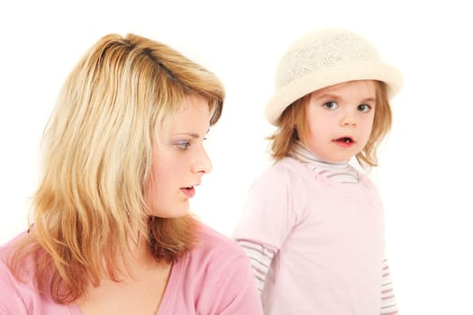 Portrait of young mother and daughter, studio shot
