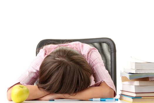 Teenage girl studying with textbooks - slleeping on table