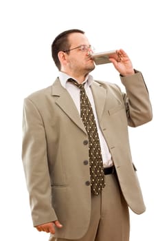 Businessman drinking from a flask