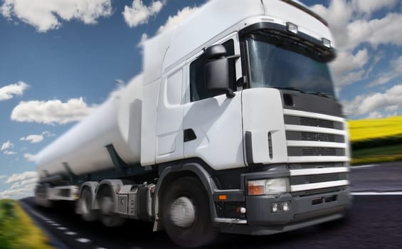 truck driving on country-road/motion blur