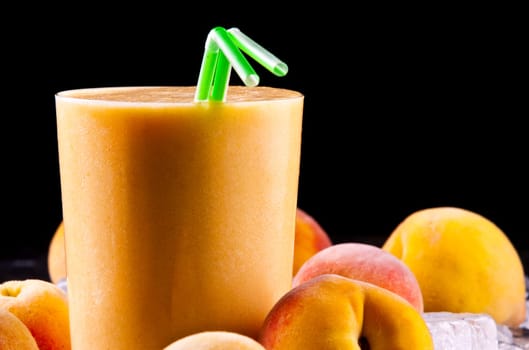 A glass of freshly made peach smoothie