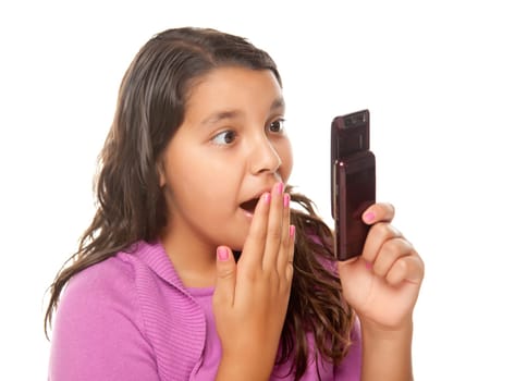 Shocked Pretty Hispanic Girl On Cell Phone Isolated on a White Background.